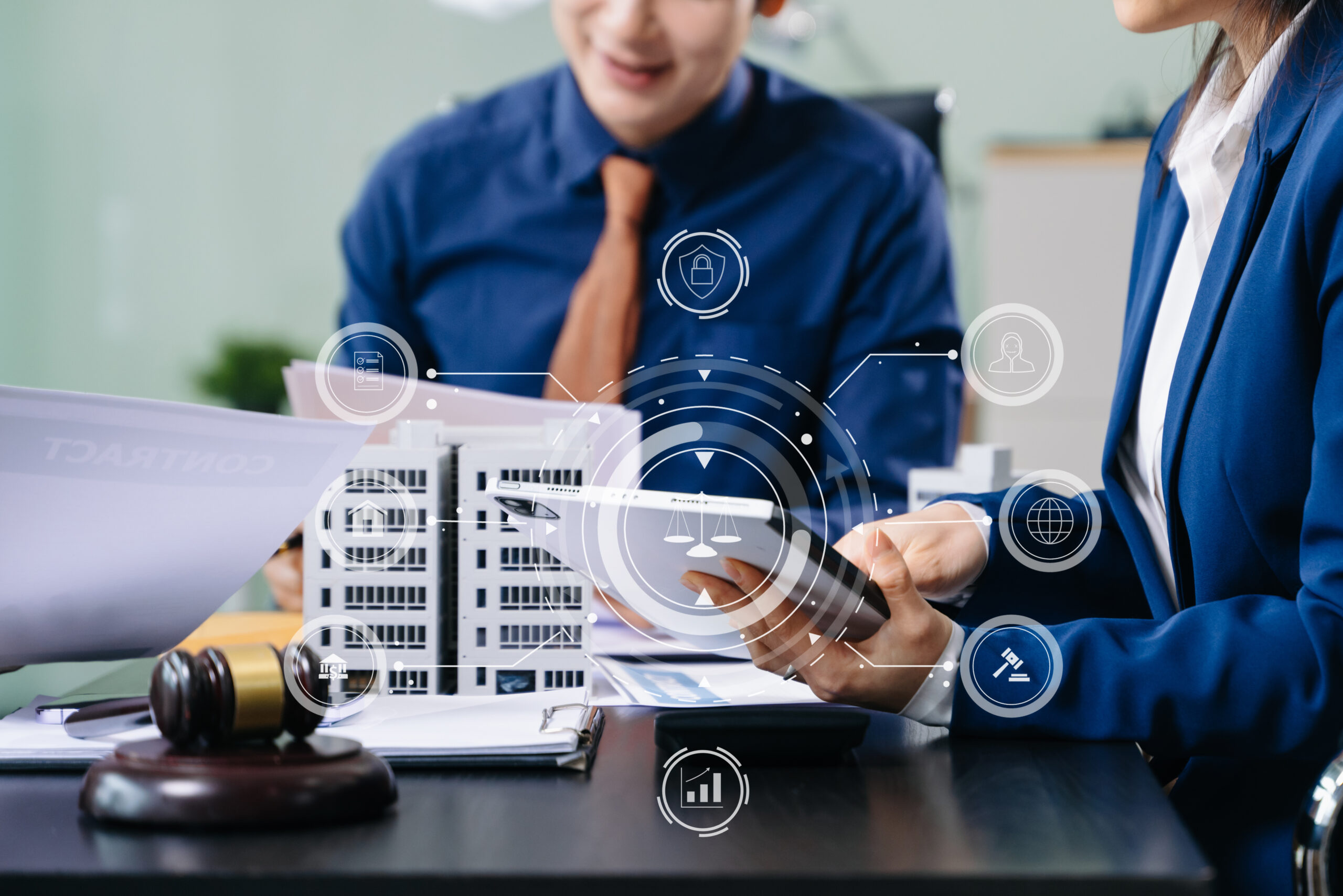 business meeting with legal and real estate advisors using AI technology, digital interfaces, and data-driven planning in a smart office